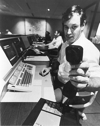 Staff shows telephone line in 1990