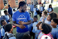 Former VCU basketball player Mo Alie-Cox, visited the Richmond Police Athletic League's Summer Camp at SCOR Sports Center of Richmond