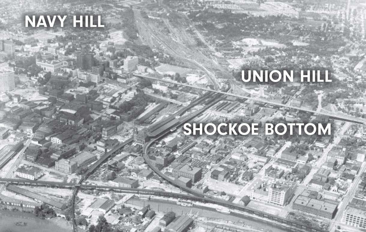 Aerial view of Shockoe Bottom prior to the construction of I-95. Main Street Station is at the Center.