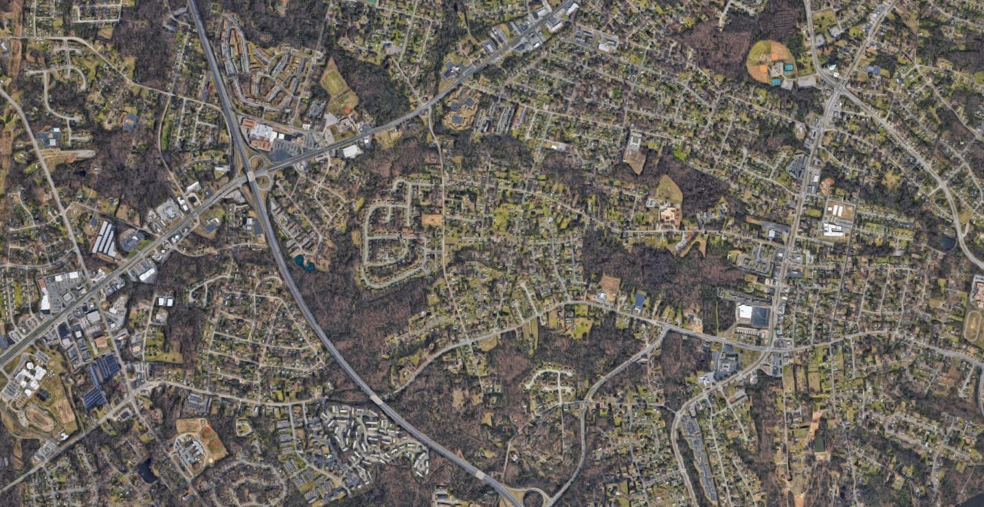 This images is an aerial photo of a suburban land use pattern with lots of dead end streets and less dense housing 