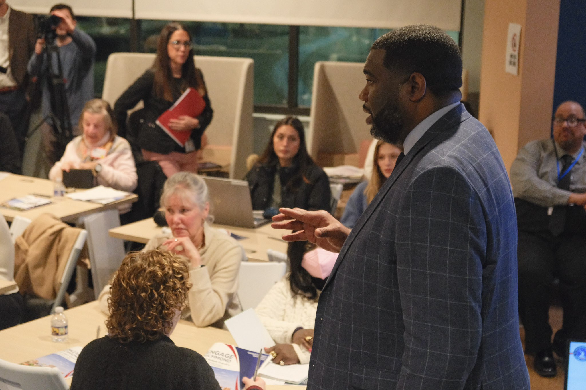 Richmond CAO Odie Donald II speaks with residents at a budget town hall, 2026