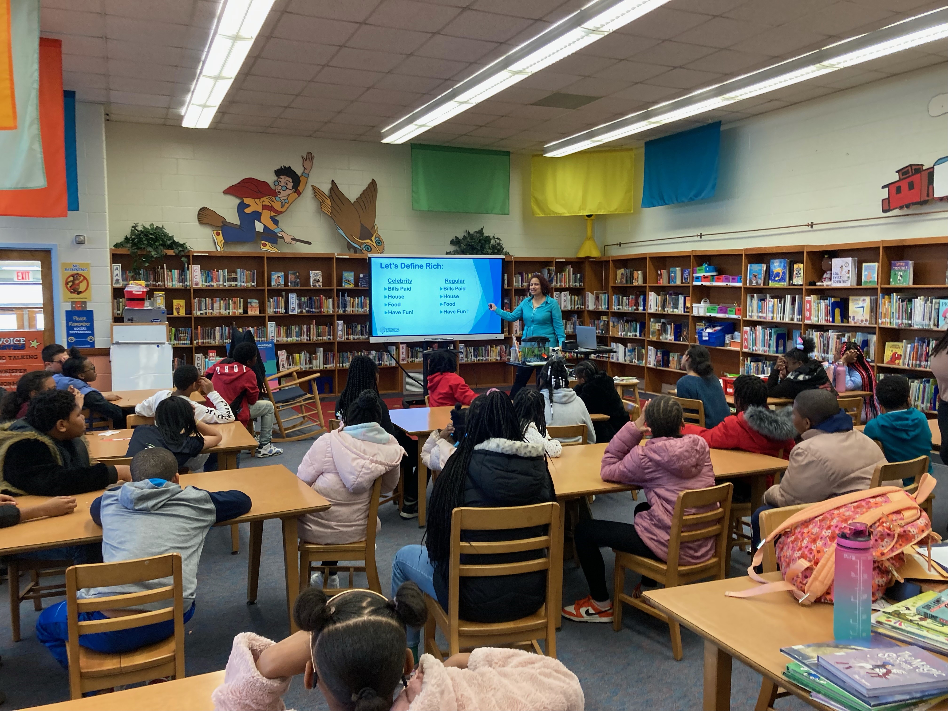 City Treasurer Nichole Armstead teaching a class at Woodville Elementary school