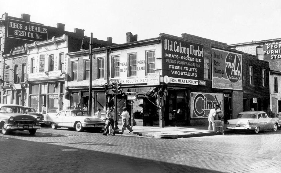 This is an old photograph of an intersection in Navy Hill showing the style as similar to Jackson Ward