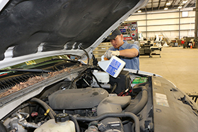 Fleet - Image - Mechanic working on a truck