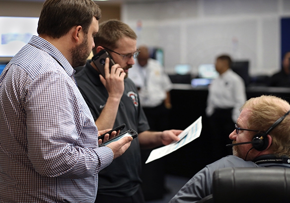 Staff checking phone system