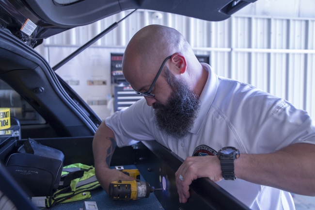 Staff working on a vehicle