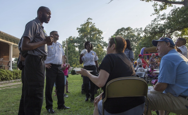 DEC staff visit neighbors during National Night Out