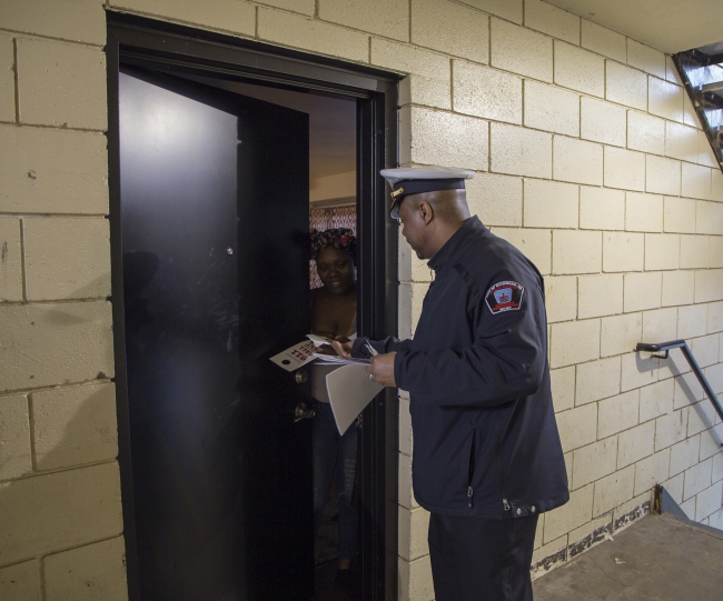 DEC staff visit residents at Belt Atlantic Apartments